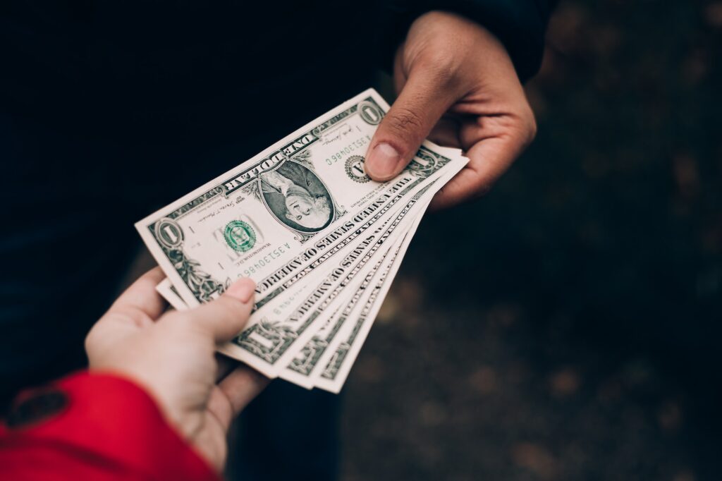 Transfer of money from hand to hand
